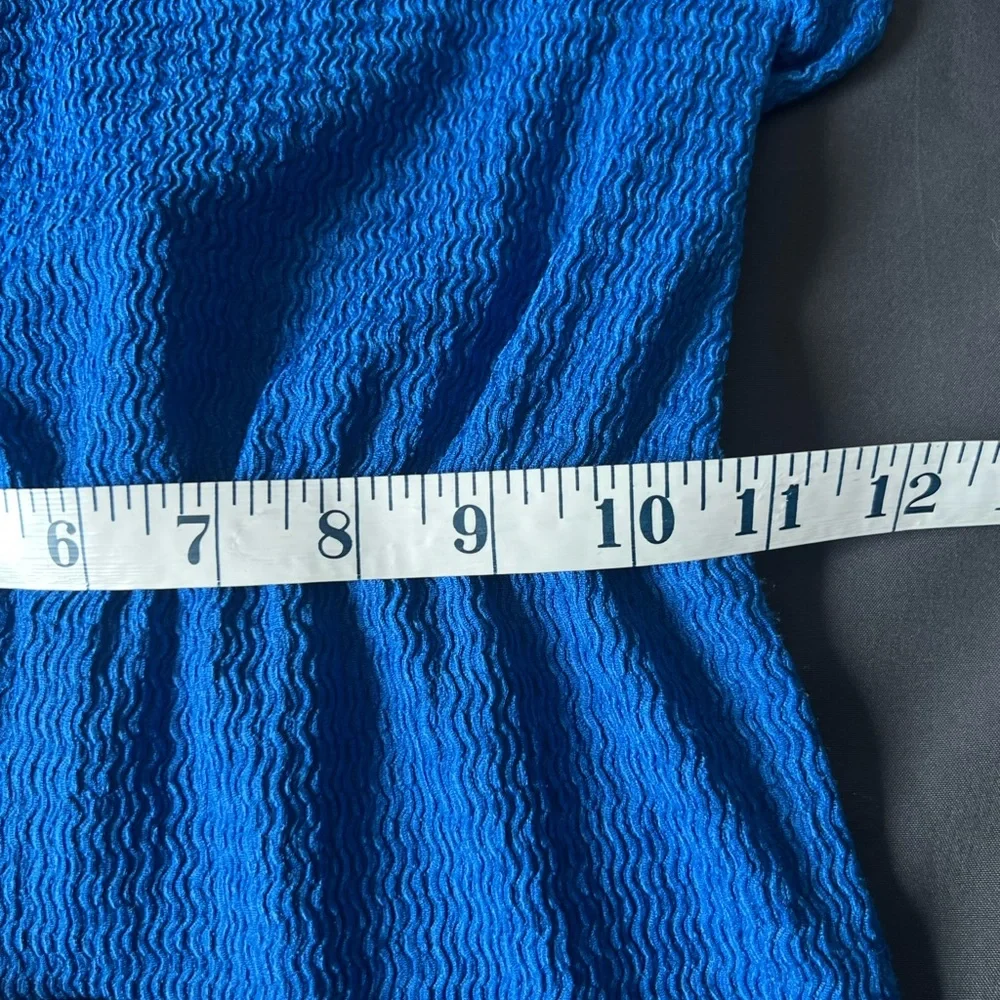 Primark royal blue textured jumpsuit with round neck and flutter sleeves
